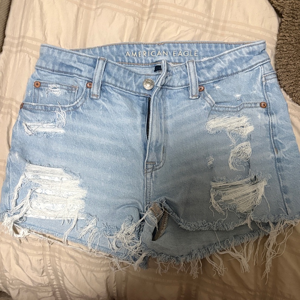 American Eagle Outfitters Ripped Light Blue Jean Shorts